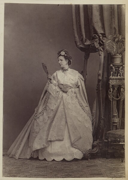 Unknown, [Woman looking at reflection]