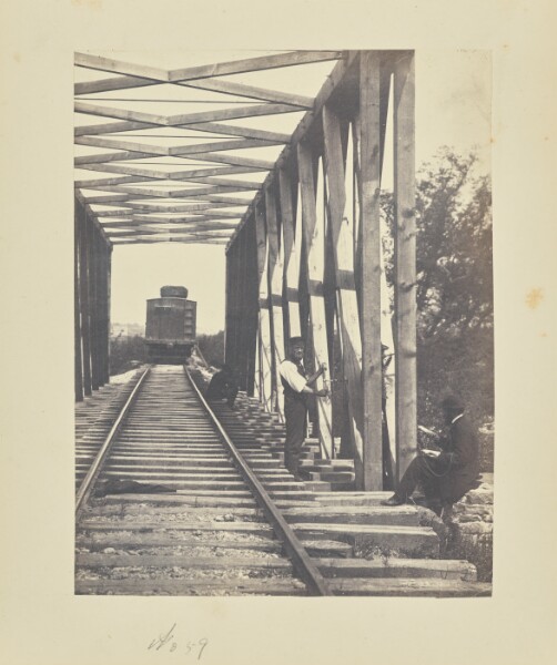 A. J. Russell, [Destroying a truss bridge]