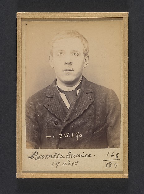 Alphonse Bertillon, Bassille. Maurice, Eugène. 19 ans, né à Paris Ille. Portefeuilliste. Anarchiste. 9/3/94.