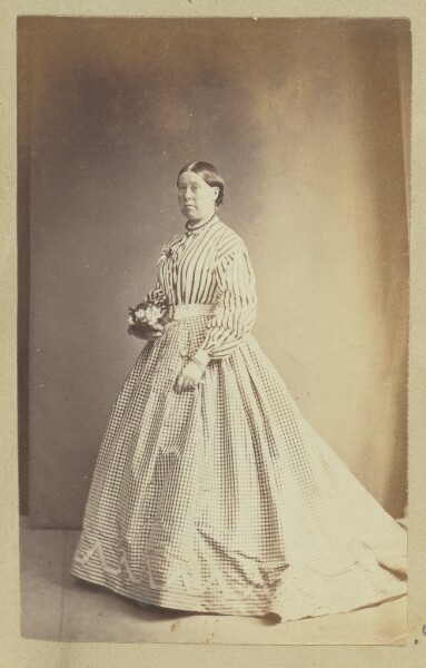 Unknown, [Portrait of woman holding small bouquet]
