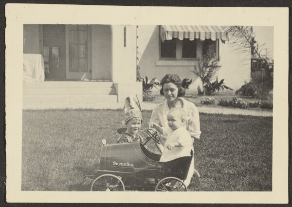 Louis Fleckenstein, [Woman with Children in Toy Car]