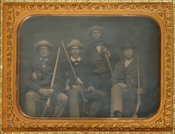 Unknown, [Portrait of four men with rifles]