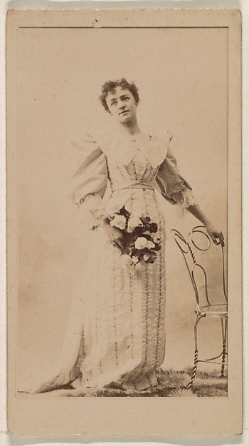 Kinney Brothers Tobacco Company, Woman standing with hand on chair, from the Actresses series (N245) issued by Kinney Brothers to promote Sweet Caporal Cigarettes