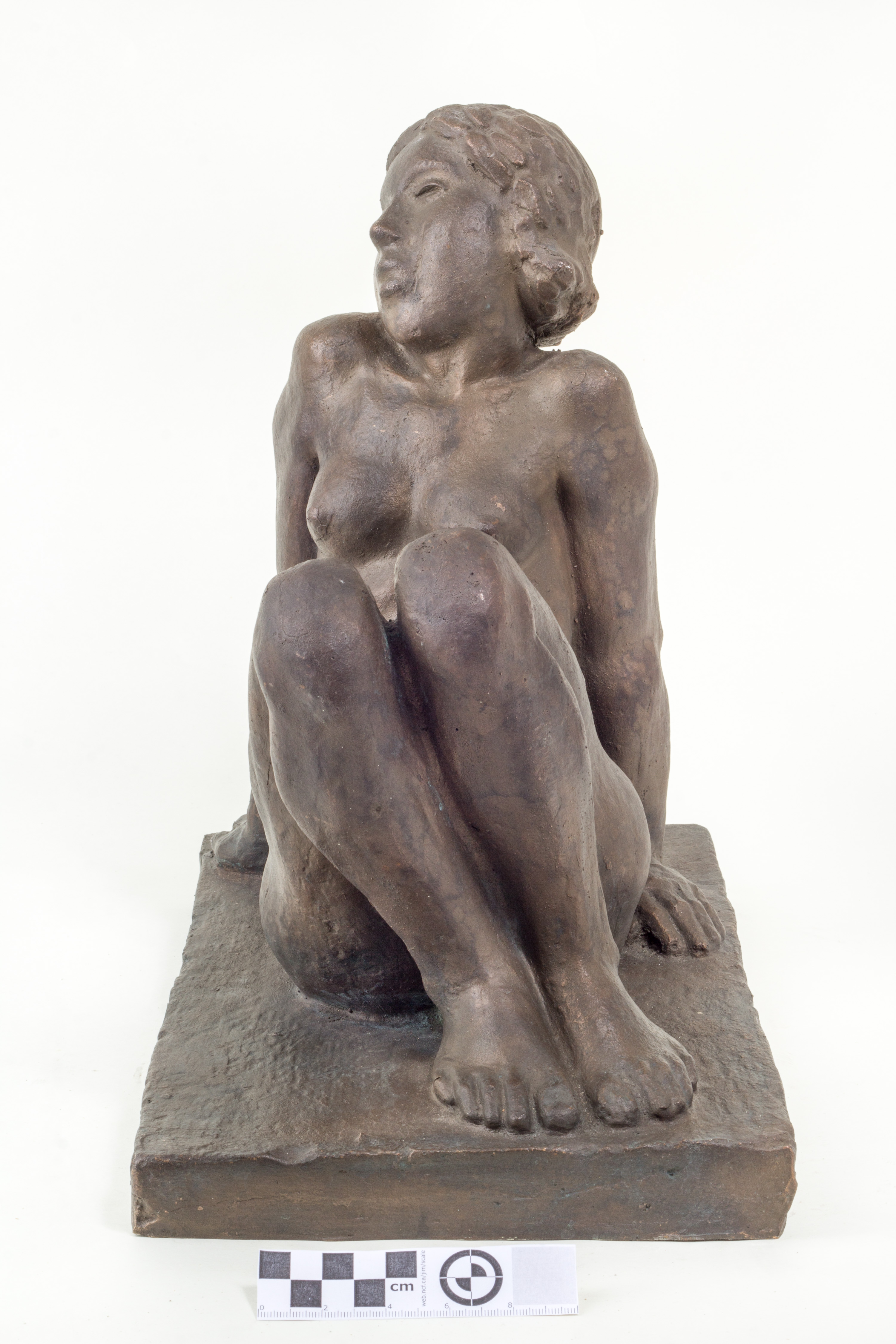 Anton (autor) Starkopf, seated female figure