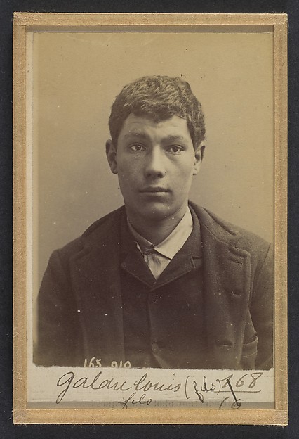 Alphonse Bertillon, Galau. Charles. 18 ans, né à Nogent s/Marne (Seine). Charron. Cris séditieux. Anarchiste. 21/2/91.