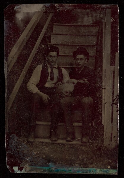 Unknown, [Portrait of Two Young Men in hats Holding a Goose]