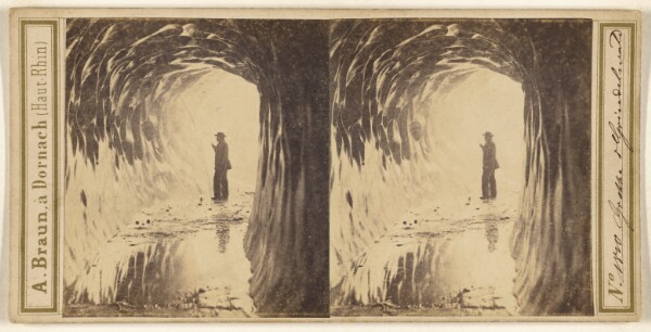 Adolphe Braun, [Man standing inside of ice cave]