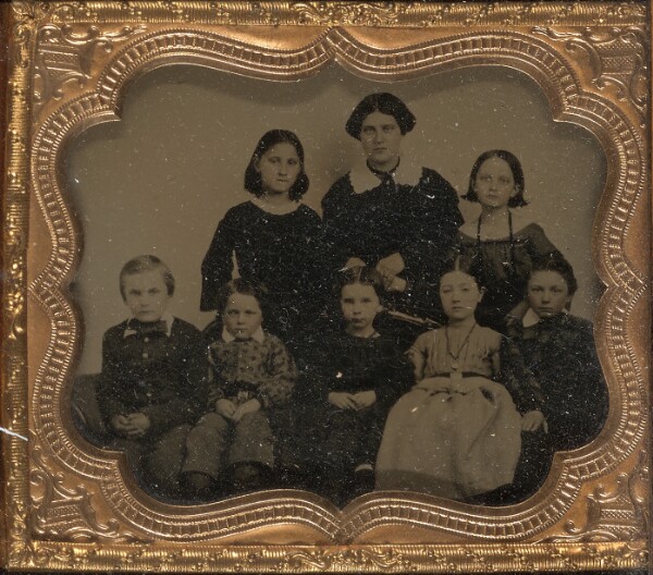Unknown, [Group portrait of a woman with seven children]