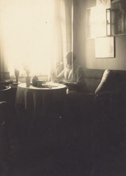 Oskar Schlemmer, [Oskar Schlemmer Seated at Table with Coffee Service at Prellestrasse]
