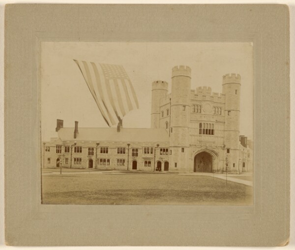 Unknown, [View of possibly a college dormitory with an American flag]
