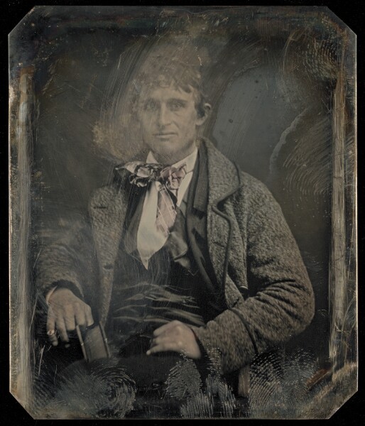 Unknown, [Portrait of a Seated Man Holding a Book]
