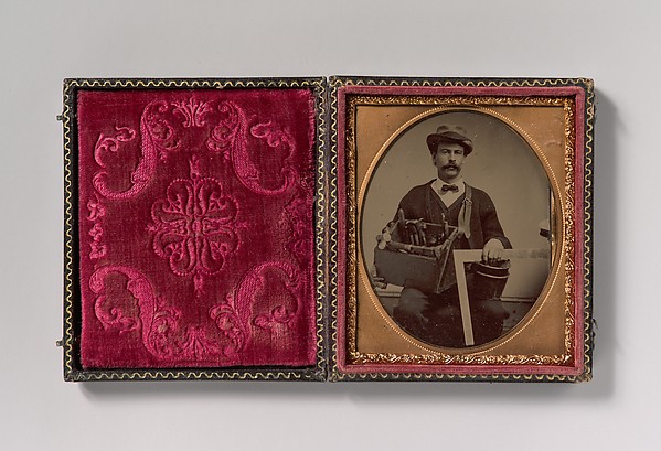 Unknown, [Carpenter Holding a Bag of Tools and a Square]