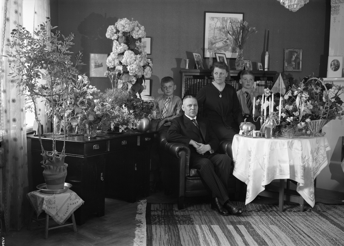 Paul Sandberg, Birthday Portrait - Police Commissioner Herman Bengtsson with Family in Home Environment, Uppsala 1935