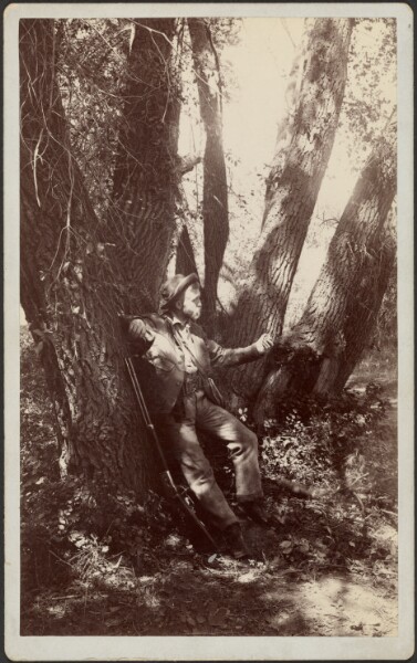 Unknown, [F.A. Williams resting against tree]