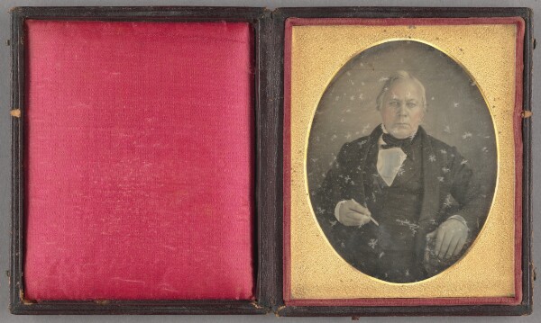 Unknown, [Portrait of a Seated Middle-aged Man Holding a Pen]