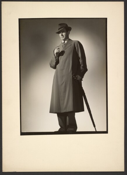 Günther Krampf, [Man modeling trench coat]