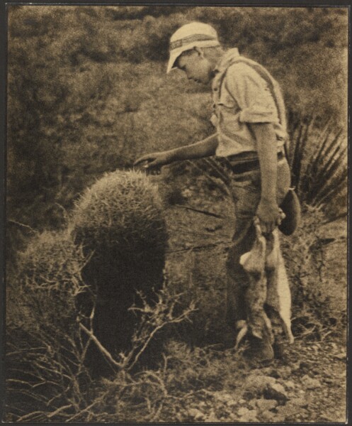 Louis Fleckenstein, [Man with Jack Rabbits]