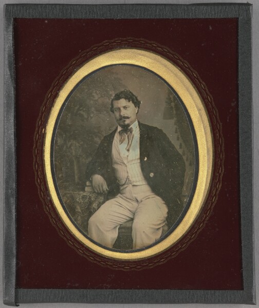 Unknown, [Portrait of a Seated Man Resting Arm on Books]