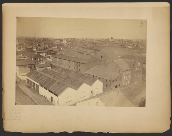 A. J. Russell, View of Alexandria, Pioneer Mills, Government Hay Barns in Foreground. [May 1865].