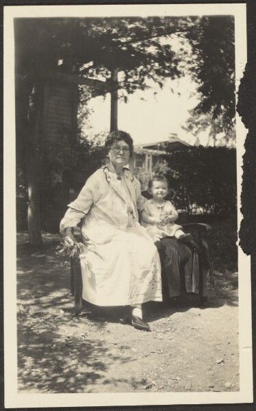 Louis Fleckenstein, [Old Woman and Child in Backyard]