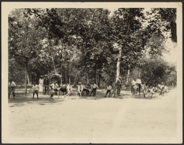 Louis Fleckenstein, [Children Playing with Hoops in Park]