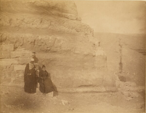 Unknown, [Two men at base of ruins]