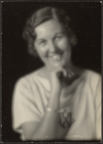 Louis Fleckenstein, [Woman Smiling with Hand on Chin]