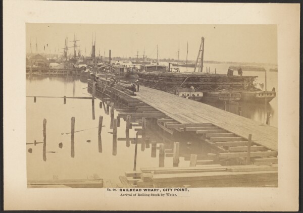 A. J. Russell, No. 60. Railroad Wharf, City Point, Arrival of Rolling Stock by Water. [July 1864].