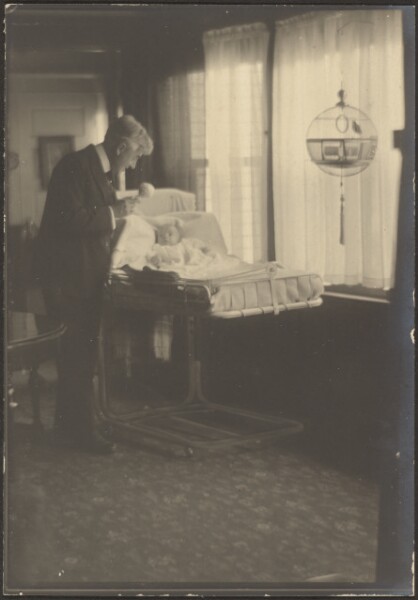 Louis Fleckenstein, [Man and Infant with Birdcage]