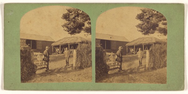 Unknown, [Two men at gate of French farm]
