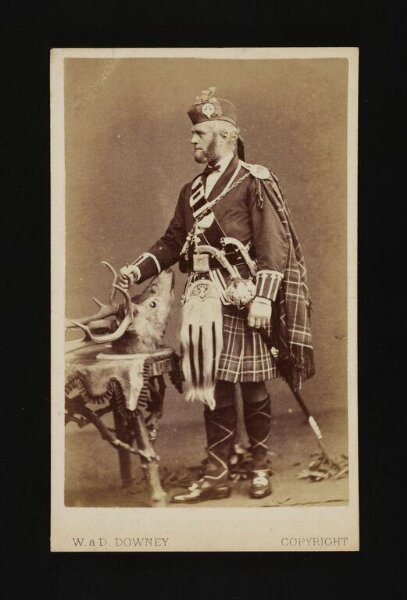 W. & D. Downey, A portrait of a man with stag head