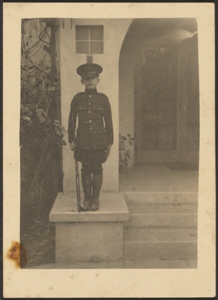 Louis Fleckenstein, [Boy in Uniform Standing on Steps]