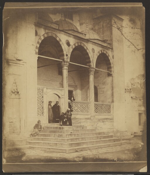 Felice Beato, [Middle Eastern Street Scene with Group in Doorway]