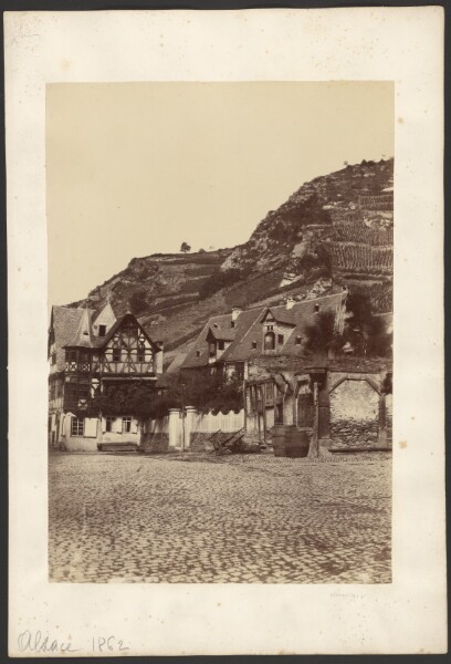 Unknown, [Town at base of mountains]