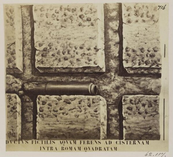 Parker, John Henry, Construction - Portion of the early concrete Wall on the Palatine, with large grooves formed by beams of wood, and a horizontal Water-pipe of Terra Cotta, conveying water to the Reservoir.