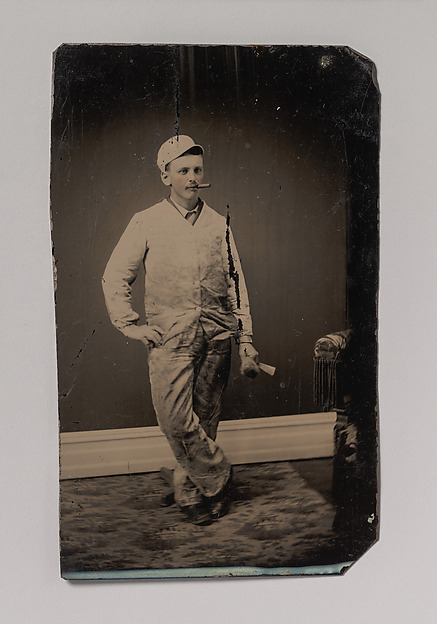 Unknown, [Painter, Smoking a Cigar, Holding a Brush and Scraper]