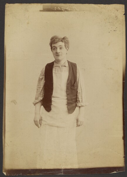 Unknown, [Man wearing a vest and apron]