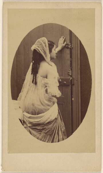 Unknown, [Woman with bare-shoulder gown with hand against a door preventing someone from entering]