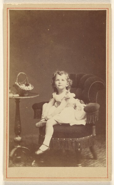 London Stereoscopic and Photographic Company, [Little girl posed and seated]