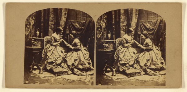 London Stereoscopic and Photographic Company, [Two women seated looking at a letter]