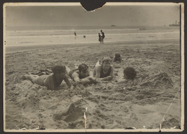 Louis Fleckenstein, [Children Laying in Sand at Beach]