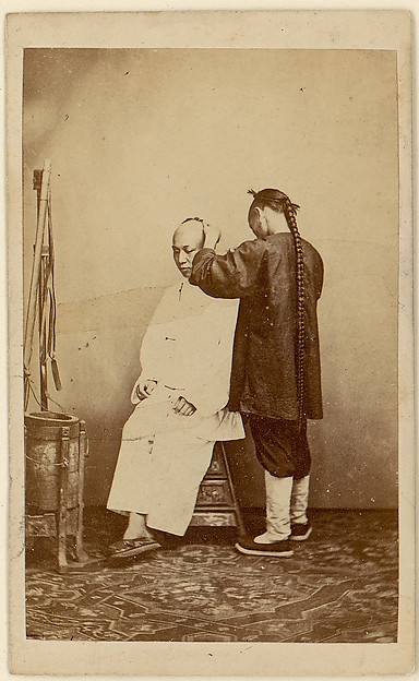 Unknown, [Man Examining Other Man]
