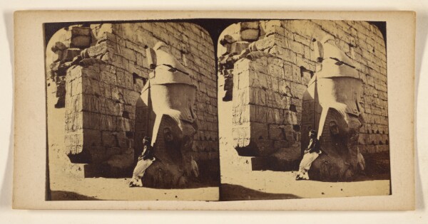 Francis Frith, [Man seated on carved statue in ruins]