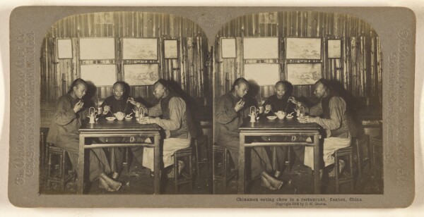 Carleton H. Graves, Chinamen eating chow in a restaurant. Canton, China.