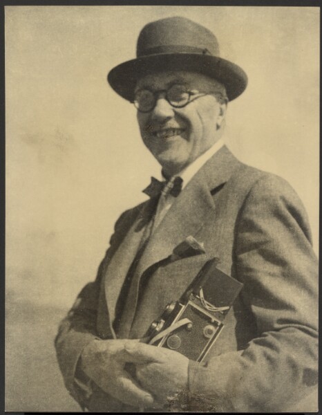 Louis Fleckenstein, [Portrait of a Man with a Camera]