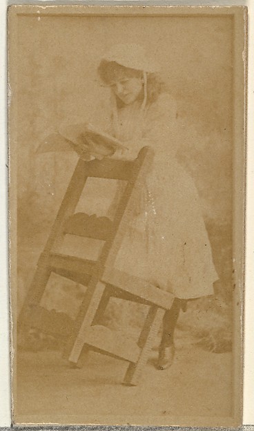 W. Duke, Sons & Co., [Actress reading book while leaning on chair], from the Actors and Actresses series (N145-8) issued by Duke Sons & Co. to promote Duke Cigarettes