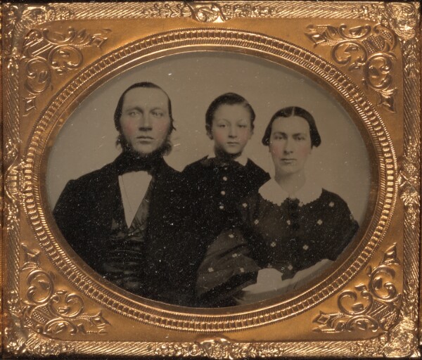 Unknown, [Family portrait of three members]
