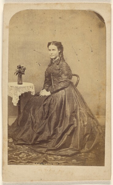 Unknown, [Unidentified woman with long curls, seated]