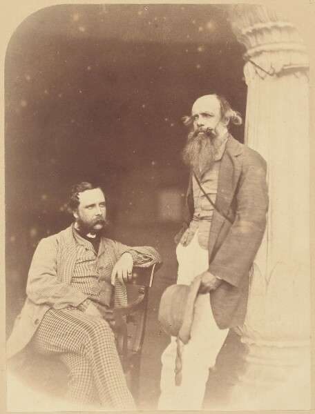 Felice Beato, [Portrait of two European men, one seated, one standing]