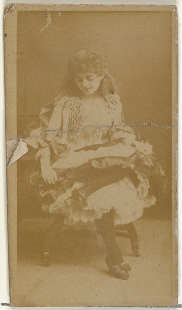 W. Duke, Sons & Co., [Seated actress, looking down], from the Actors and Actresses series (N145-8) issued by Duke Sons & Co. to promote Duke Cigarettes